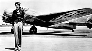 Amelia Earhart with her iconic Lockheed Electric aircraft in which she disappeared attempting to circumnavigate the globe in July 1937.