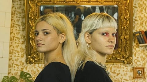 Georgian twins Amy and Ano pictured side-by-side 
