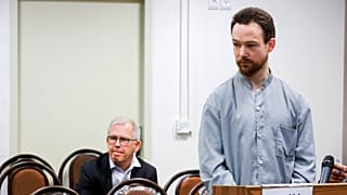 In this photo released by Mizan News Agency on Sunday, Dec. 10, 2023, Swedish citizen Johan Floderus arrives at a courtroom at the Revolutionary Court in Tehran, Iran. 