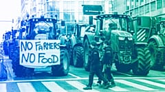 Tractors are parked near the European Parliament during a protest by farmers as European leaders meet for an EU summit in Brussels, February 2024