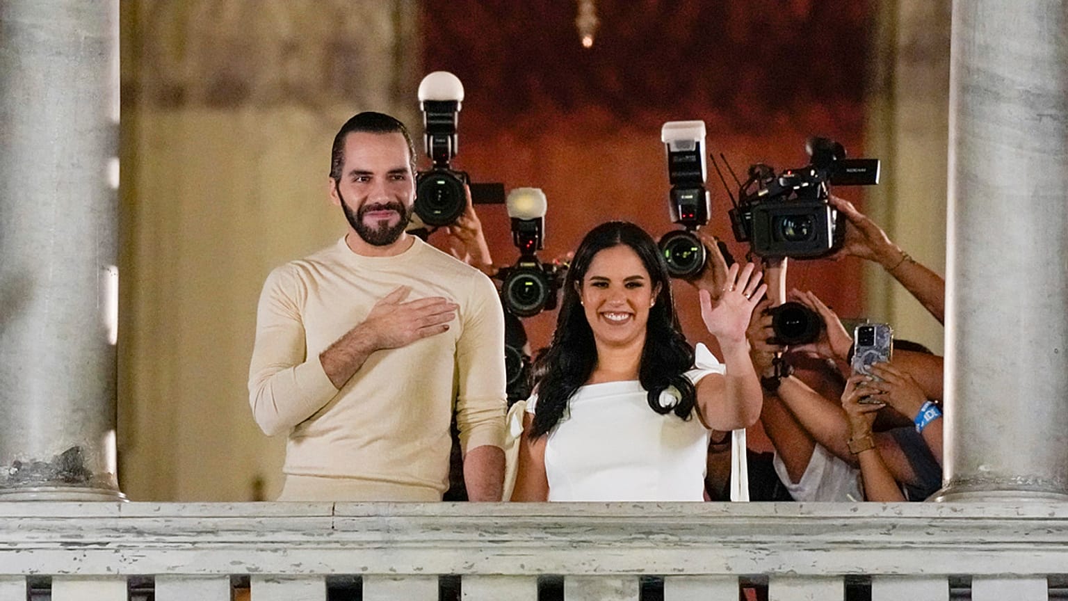 El Salvador President Nayib Bukele, left, accompanied by his wife Gabriela Rodriguez.
