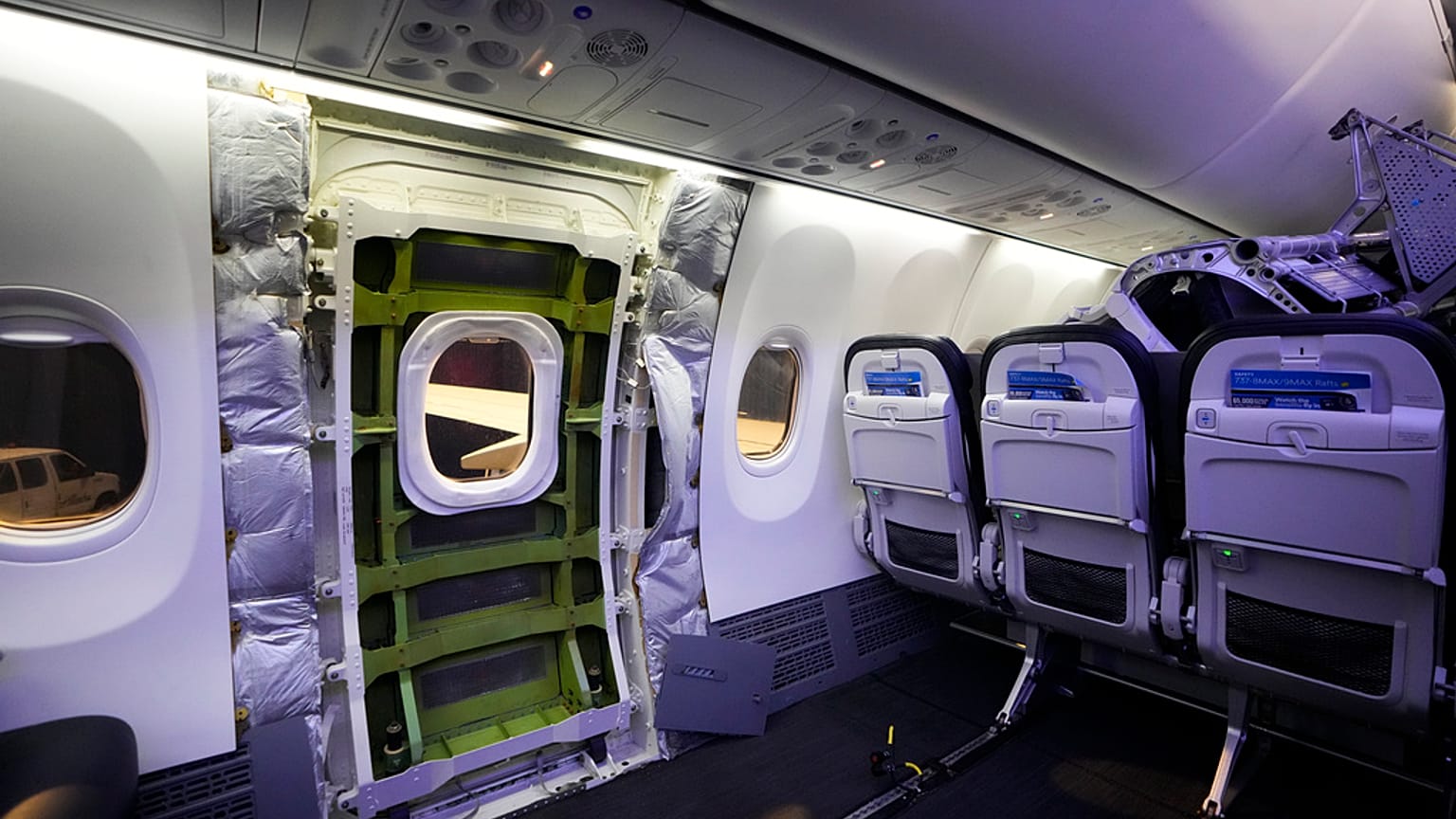 A door plug area of an Alaska Airlines Boeing 737 Max 9 aircraft awaits inspection