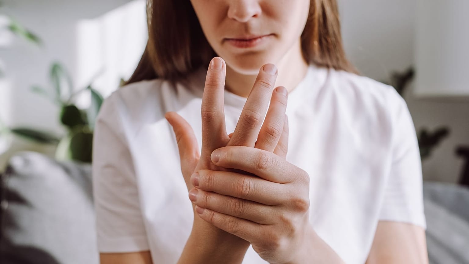 Woman with rheumatoid arthritis, an autoimmune disease. 