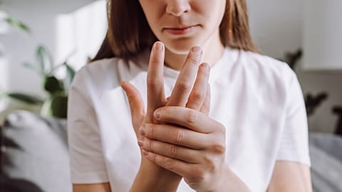 Woman with rheumatoid arthritis, an autoimmune disease. 