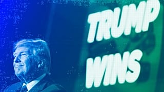 Republican presidential candidate former President Donald Trump speaks at a caucus night party in Des Moines, Iowa, January 2024