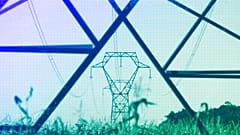 Electricity poles are seen in the countryside outside Lyon, September 2022