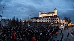 People gather in a protest against a government plan to amend the penal code, in front of the National Council of the Slovak Republic in Bratislava, Feb. 7, 2024. 