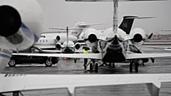 Planes are parked at a private jet terminal at Harry Reid International Airport in Las Vegas on Thursday, ahead of the Super Bowl this weekend