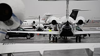 Planes are parked at a private jet terminal at Harry Reid International Airport in Las Vegas on Thursday, ahead of the Super Bowl this weekend