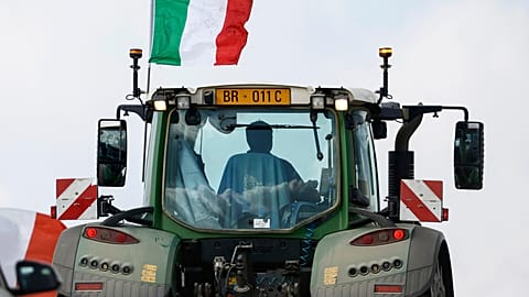 A farmer drives his tractor on the outskirts of Rome, Thursday, Feb. 8 , 2024