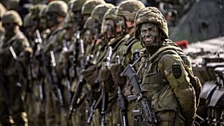 FILE: Swedish conscript soldiers take part in the Aurora 23 military exercise at the Rinkaby firing range outside Kristianstad, Sweden, Saturday, May 6, 2023.