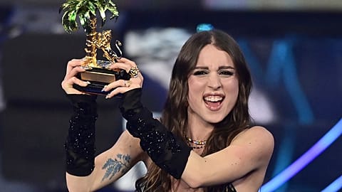 Angelina Mango celebrates after winning the 74th edition of the Sanremo Italian Song Festival. Saturday, Feb. 10, 2024