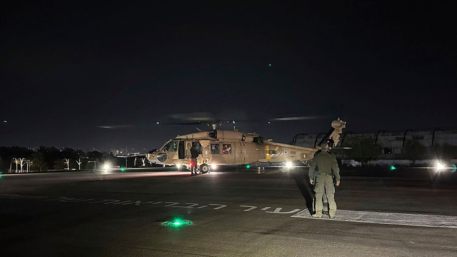 an Israeli Air Force helicopter carrying two released hostages