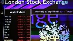A screen displays market information inside the London Stock Exchange in the City of London, Thursday, Sept. 22, 2011. 