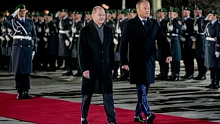 German Chancellor Olaf Scholz, left, welcomes Poland's Prime Minister Donald Tusk with military donors in Berlin, Germany, Monday, Feb.12, 2024.