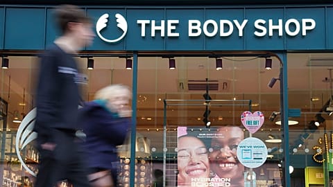 People walk past a Body Shop store in Canterbury, England, Tuesday, Feb. 13, 2024.
