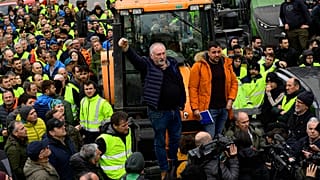 Farmers with their tractors attend a protest in Pamplona, northern Spain, Friday, Feb. 9, 2024. For fourth non stop days, farmers in Spain have staged tractor protests across