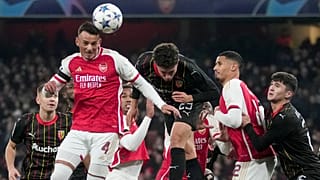 Arsenal's Ben White, front left, heads the ball during the Champions League Group B soccer match between Arsenal and Lens, at Emirates stadium, in London, 29 November 2023.