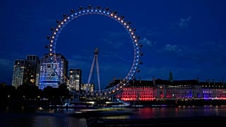 The London Eye lit up in the colors of the Ukraine to mark their Independence Day in London, Wednesday, Aug. 24, 2022.