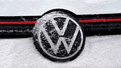 Snow glazes over the company logo on the grille of a 2024 Volkswagen GTI Saturday, Feb. 10, 2024, in Denver.