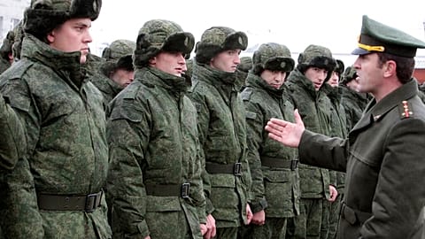 FILE- Conscripts stand at a military conscription office in Grozny, Chechnya's provincial capital, Russia,  17 November, 2014.