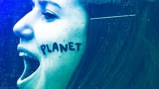 A young woman shouts slogans as she marches with thousands of others during a climate change protest in Brussels, January 2019
