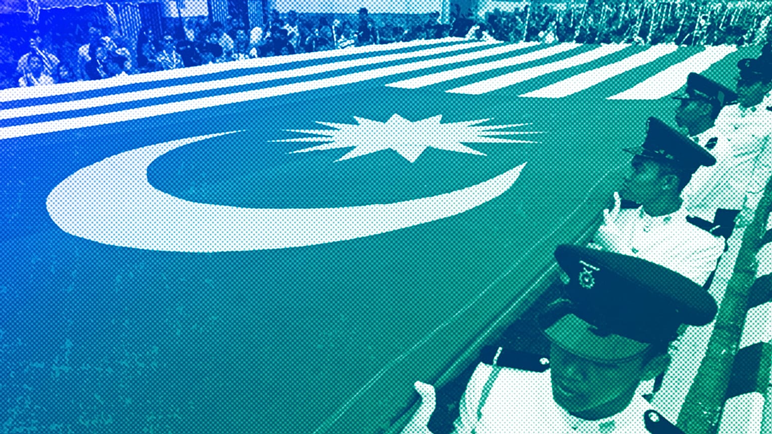 Malaysians hold a giant national flag during the 57th National Day celebrations at Independence Square in Kuala Lumpur, August 2014
