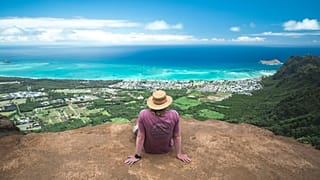 A tourist takes in the natural beauty of the Kuli'ou'ou Ridge Trail in Honolulu
