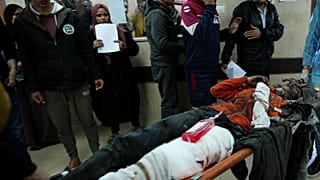 Palestinians wounded in the Israeli bombardment of the Gaza Strip are brought to a hospital in Deir al Balah, Gaza Strip, on Saturday, Feb. 17, 2024.