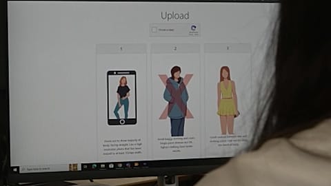 Screen with sexually explicit deepfakes site open on computer.