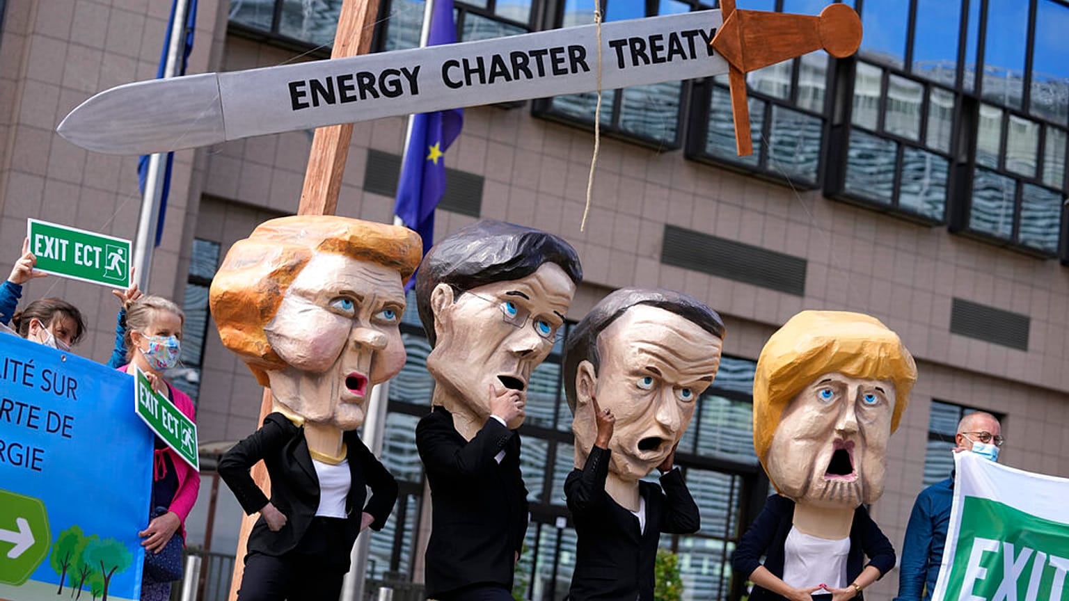 Protesters outside the EU Council headquarters in Brussels in 2021 demand withdrawal from the Energy Charter Treaty. Some now sense victory is in sight.