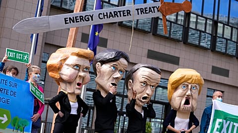 Protesters outside the EU Council headquarters in Brussels in 2021 demand withdrawal from the Energy Charter Treaty. Some now sense victory is in sight.