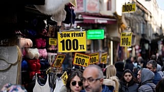 Prices are displayed in a clothes shop at Eminonu commercial area in Istanbul, Turkey, Wednesday, Feb. 21, 2024. 