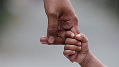 Mother's and a child hands