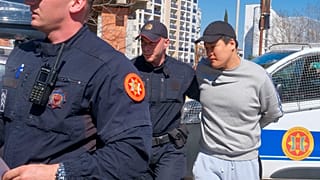 Montenegrin police officers escort South Korean citizen, Terraform Labs founder Do Kwon in Montenegro's capital Podgorica, March 24, 2023.