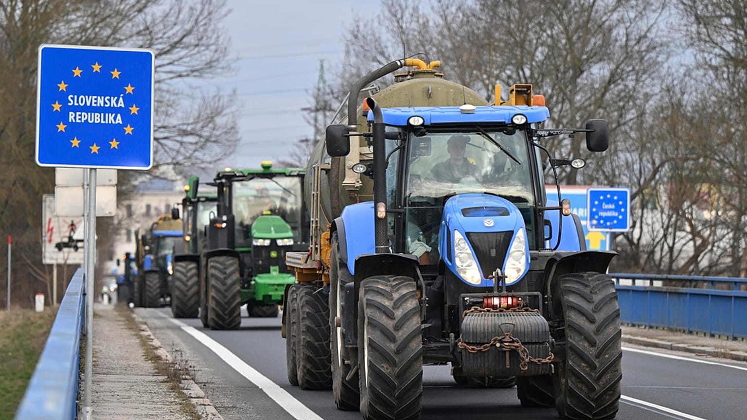 Czech farmers in tractors make their way to the Hodonín/Holíč, Czech-Slovakia border crossing, in Czech Republic, Thursday, Feb. 22, 2024