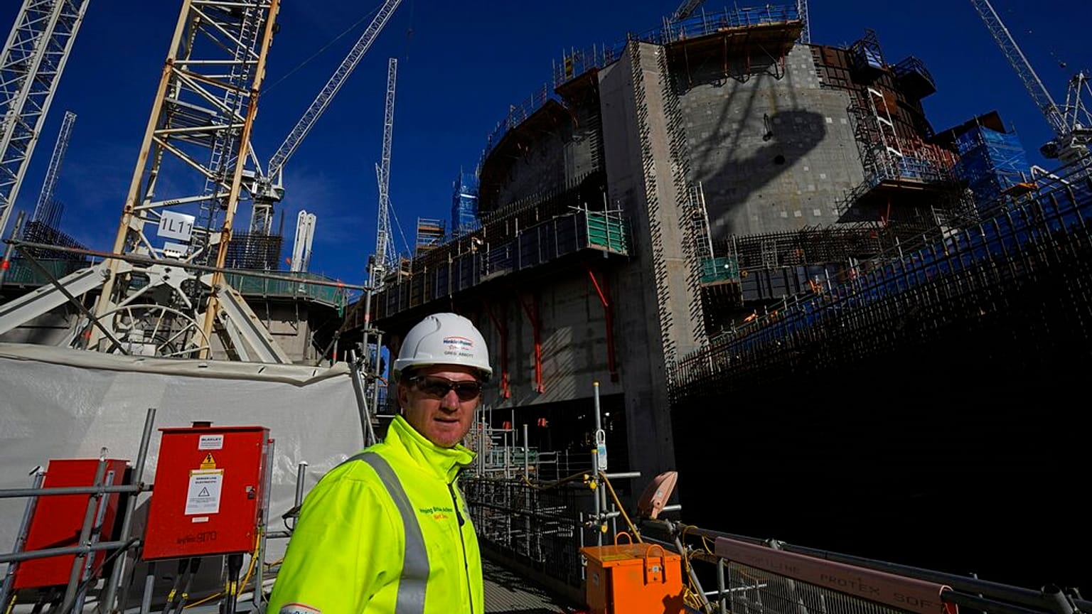An employee works at the construction site of Hinkley Point C nuclear power station in Somerset
