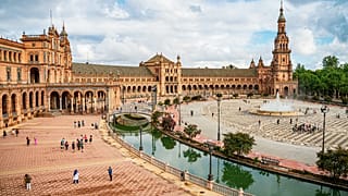 The flamboyant plaza was originally built for the 1929 Ibero-American Exhibition and designed to showcase the best of Spain in its architecture and ceramics. 