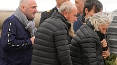 Rocco Antonio Langone, centre, his wife Maria Donata Caivano and his son Giovanni arrive at Ciampino at military airport, in Rome, Tuesday, 27 February, 2024. 