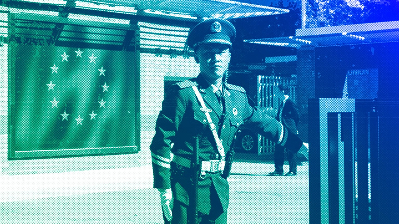 A Chinese paramilitary policeman stands guard at the entrance to the European Union Delegation to China compound in Beijing, October 2023