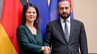 German Foreign Minister Annalena Baerbock, left, welcomes Armenia's Foreign Minister Ararat Mirzoyan for peace talks in Berlin, Germany, Wednesday, Feb. 28, 2024.