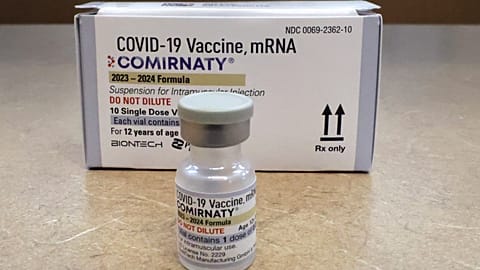 FILE - Comirnaty, a new Pfizer/BioNTech vaccination booster for COVID-19, is displayed at a pharmacy.