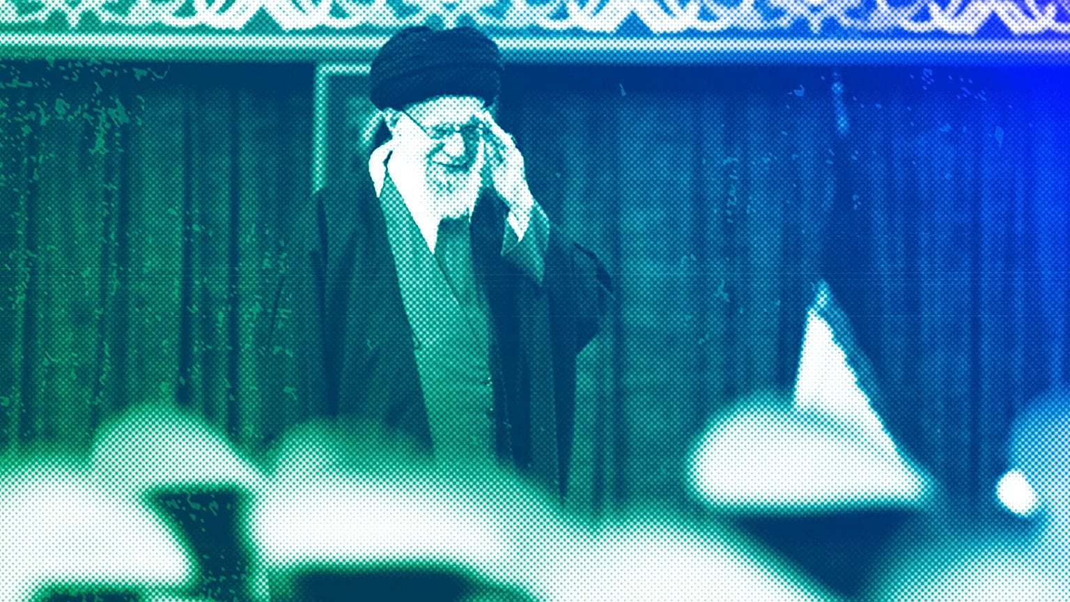 Supreme Leader Ayatollah Ali Khamenei salutes during a meeting with army's air force and air defence staff, in Tehran, February 2024