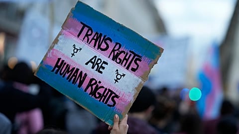 Demonstrators take part in a march to mark International Transgender Day of Visibility in Lisbon, Thursday, March 31, 2022.
