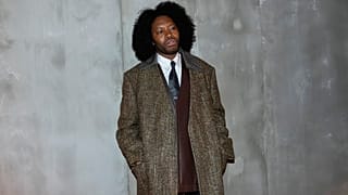 Jeremy O. Harris poses for photographers prior to the start of the Bottega Veneta women's Fall-Winter 2024-25 collection presented in Milan, Italy, Feb. 24, 2024.