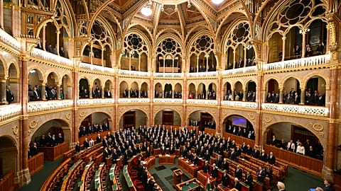 Hungarian Prime Minister Viktor Orban stand during a swearing in ceremony, Monday, Feb 26 March. 
