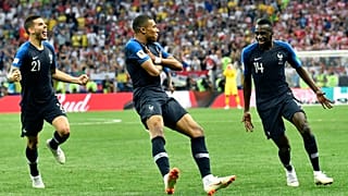 France's Kylian Mbappé celebrates after scoring his side's fourth goal during the final match between France and Croatia at the World Cup in Moscow, Russia, 15 July 2018