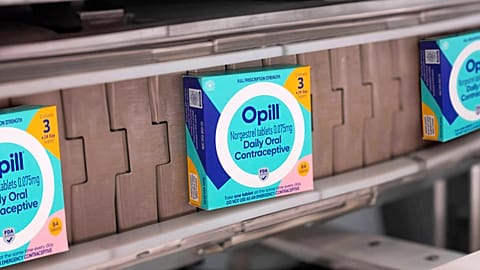 This photo shows boxes of Opill, the first over-the-counter birth control pill available later this month in the United States.