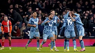 Aston Villa's Lucas Digne, right, is congratulated by his team mates after scoring his sides third goal in a match between Luton Town and Aston Villa, Saturday, March 2, 2024.