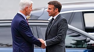 Czech Republic's President Petr Pavel, left, shakes hands with his French counterpart Emmanuel Macron at the Prague Castle in Prague, Czech Republic, Tuesday, March 5, 2024.